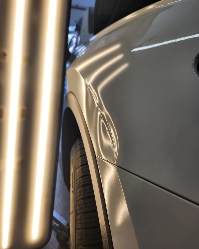 Before: fender dent